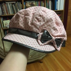 Pink polkadot sparkly hat with a bow